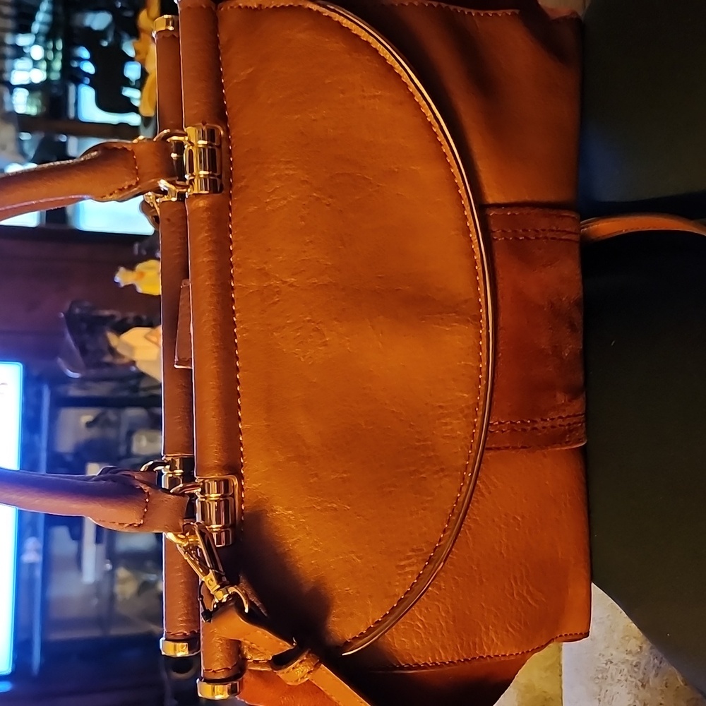 Brown leather with swade  sides